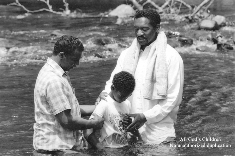 2 - Rev. BruceEdward Oliverand Deacon Johnny Allen baptising Frankie Jones_Watermark_Thumbnail.jpg