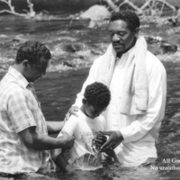 2 - Rev. BruceEdward Oliverand Deacon Johnny Allen baptising Frankie Jones_Watermark_Thumbnail.jpg